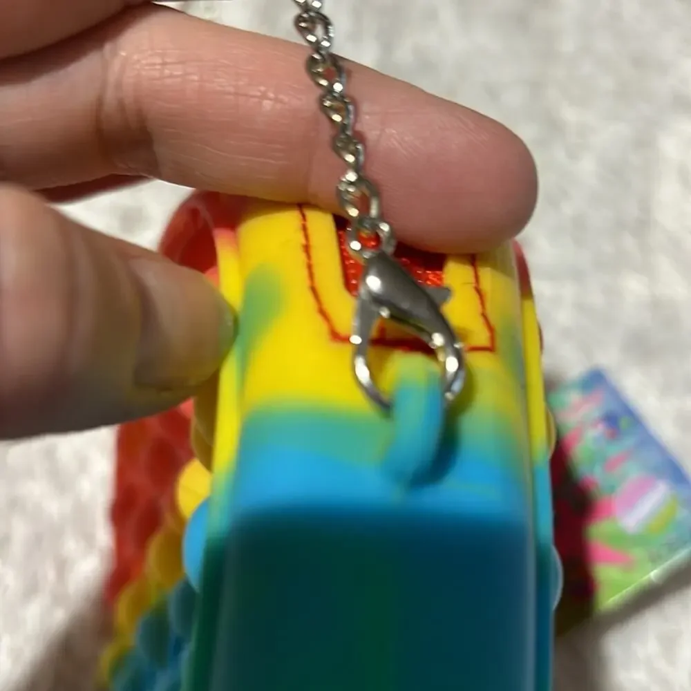 Pop Finity round crossbody purse silver chain nwt perfect fidget rainbow tie dye